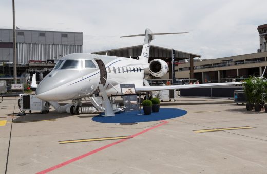 Gulfstream G280 business jet on a ramp at a business aviation show