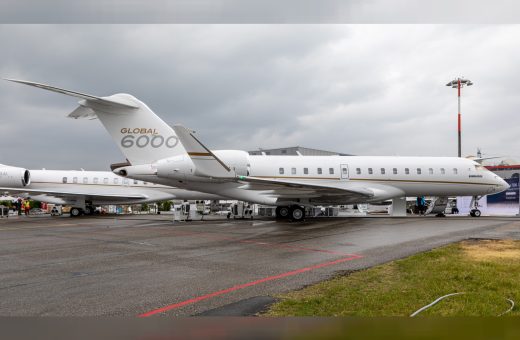 Bombardier Global 6000 heavy business jet on a ramp at a business aviation show