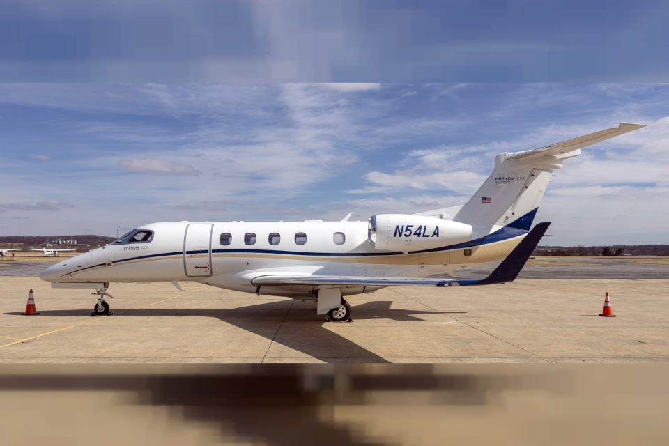 Embraer Phenom 300E parked on ramp at Frederick Municipal Airport